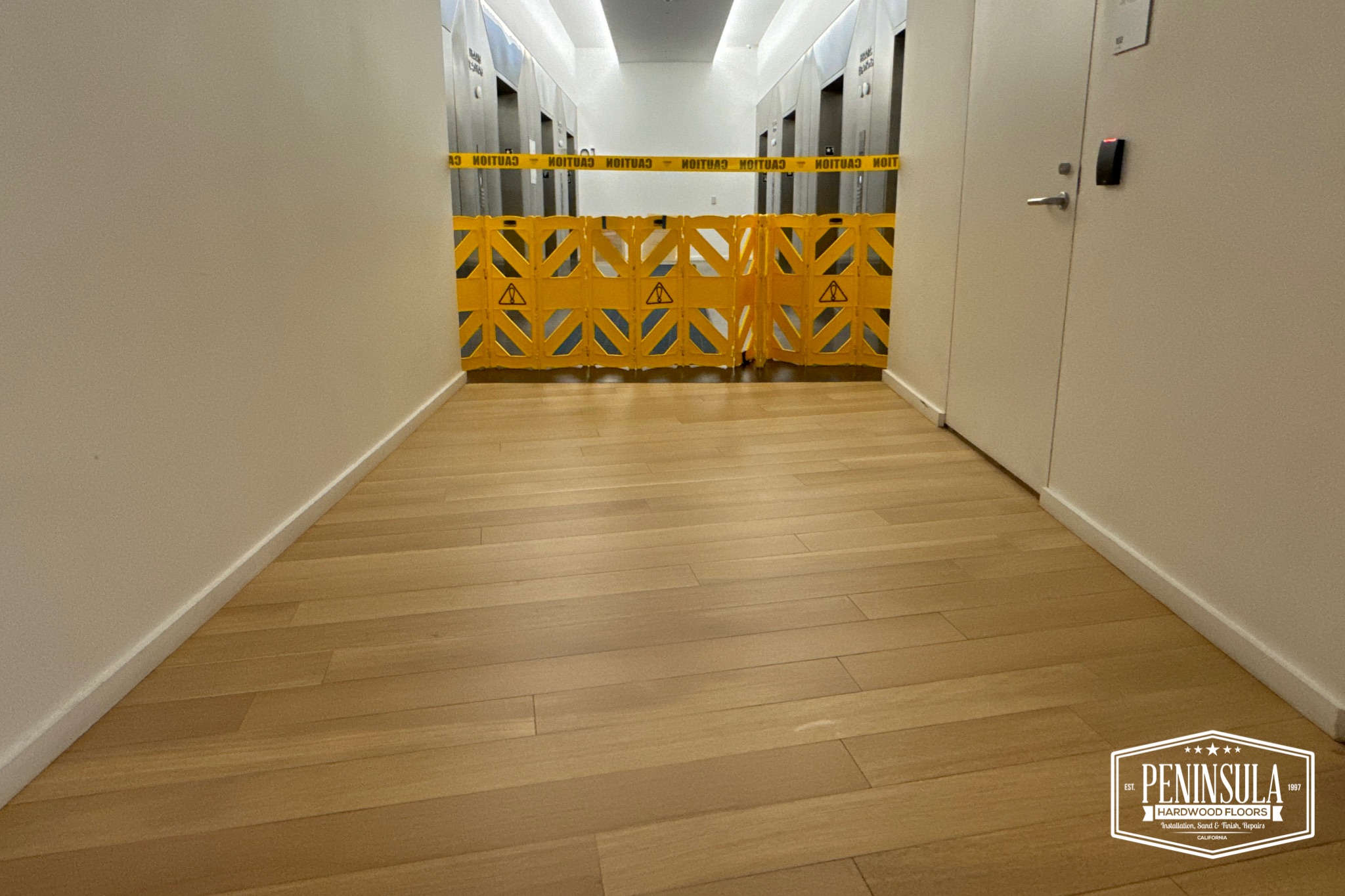 Elevator lobby with high-durability hardwood flooring