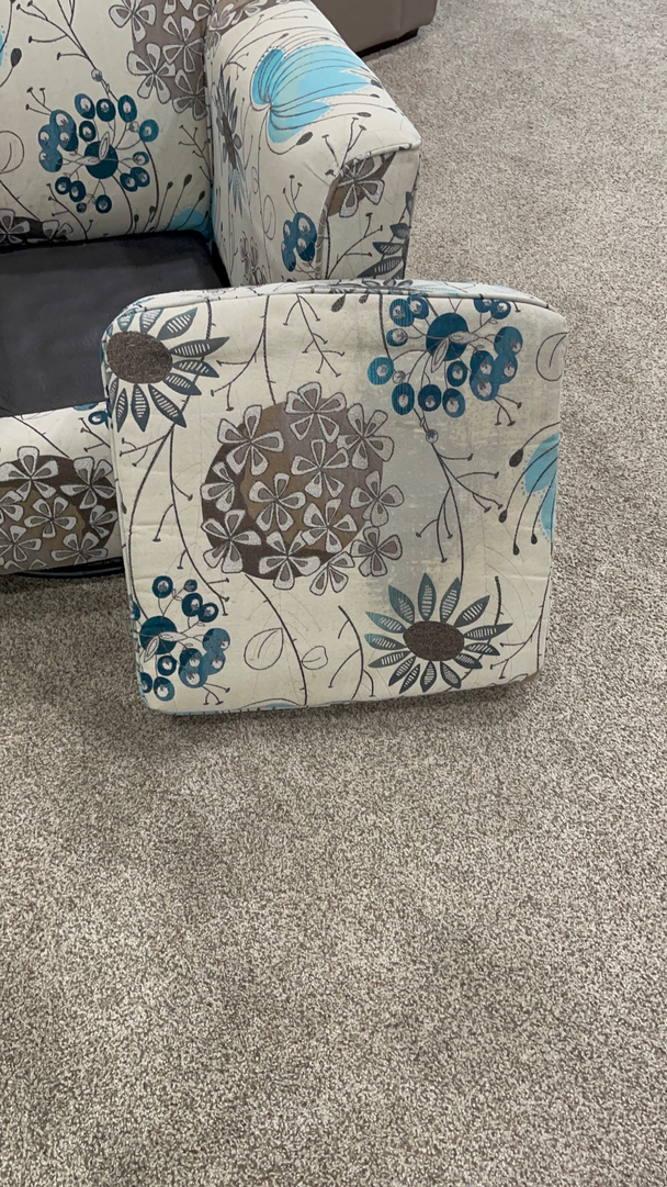 Floral upholstery cushion cleaning on gray carpet