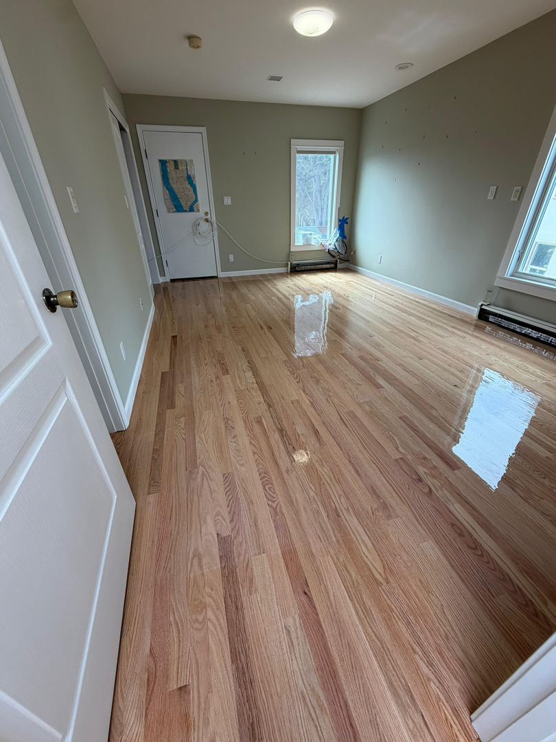Spacious room with freshly refinished hardwood floor