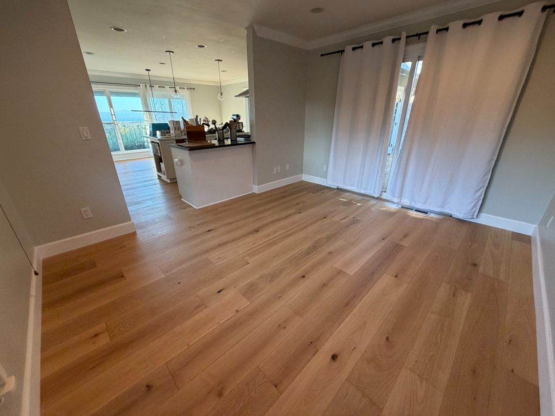 Open floor plan natural oak wood floor